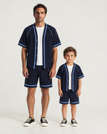 Father and son wearing the Romimi Léon Cotton Short
