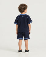 Little boy wearing the Romimi Léon Cotton Short, back view