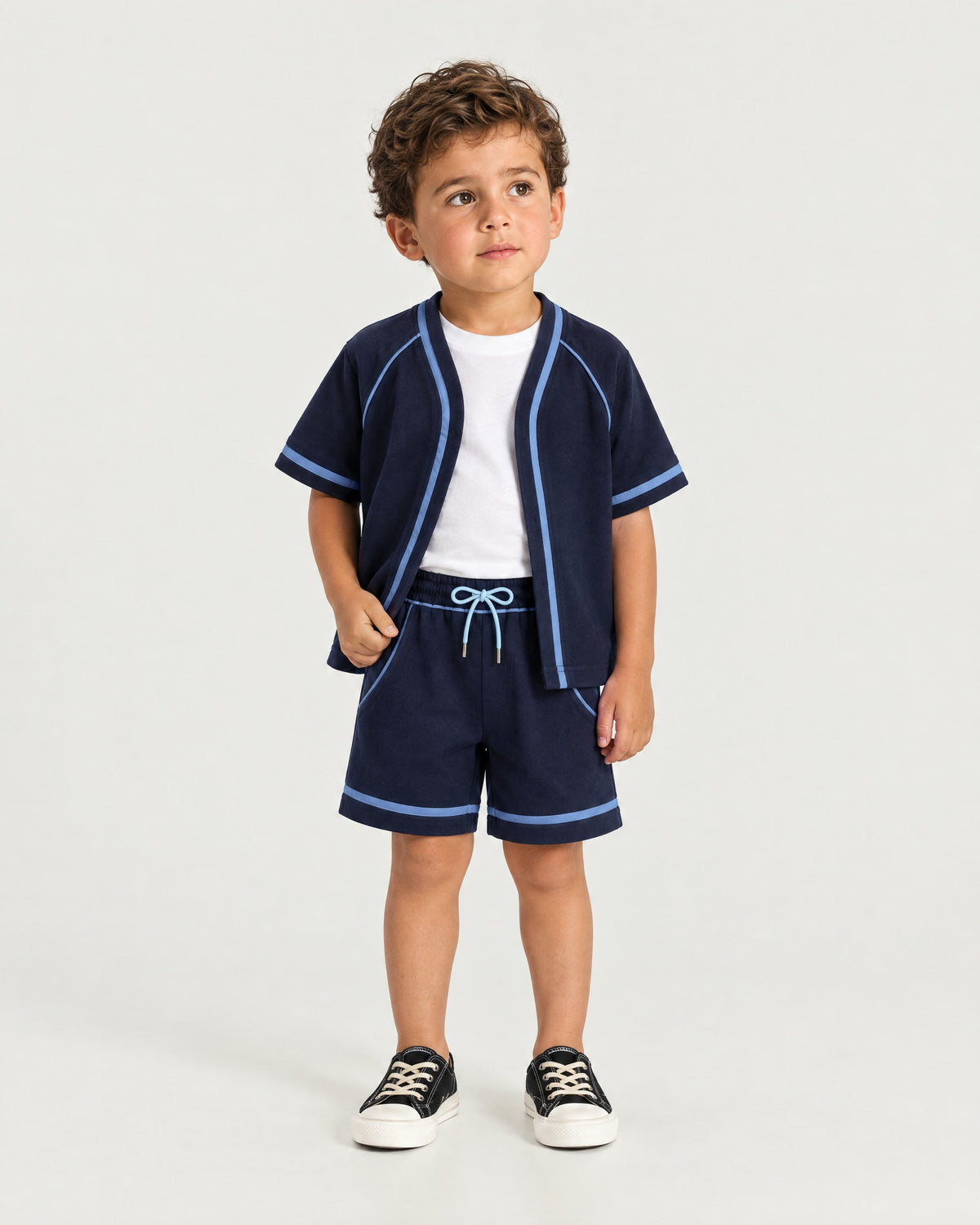 Little boy wearing the Romimi Léon Cotton Short, front view
