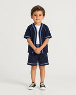 Little boy wearing the Romimi Léon Cotton Short, full length