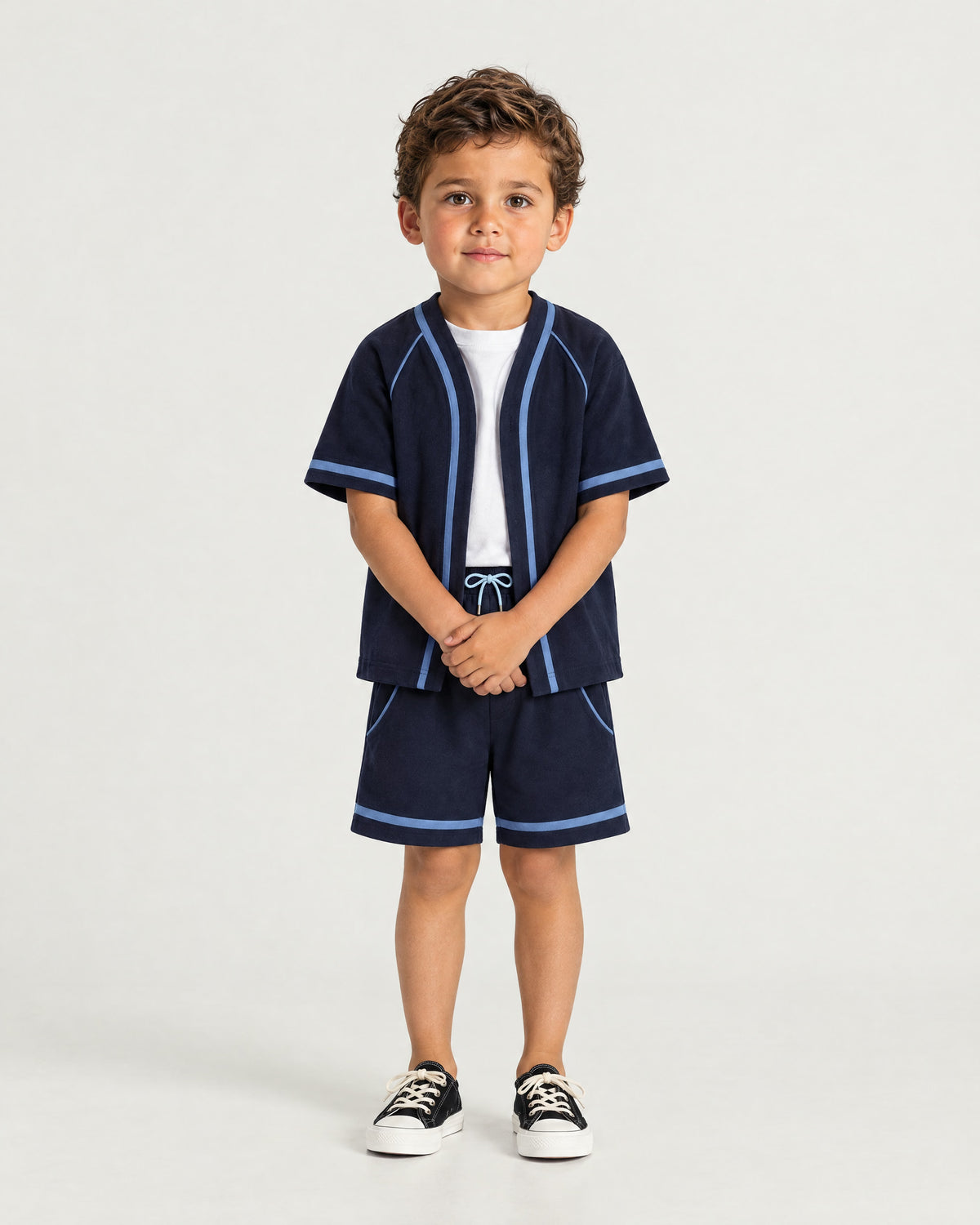 Little boy wearing the Romimi Léon Cotton Short, full length