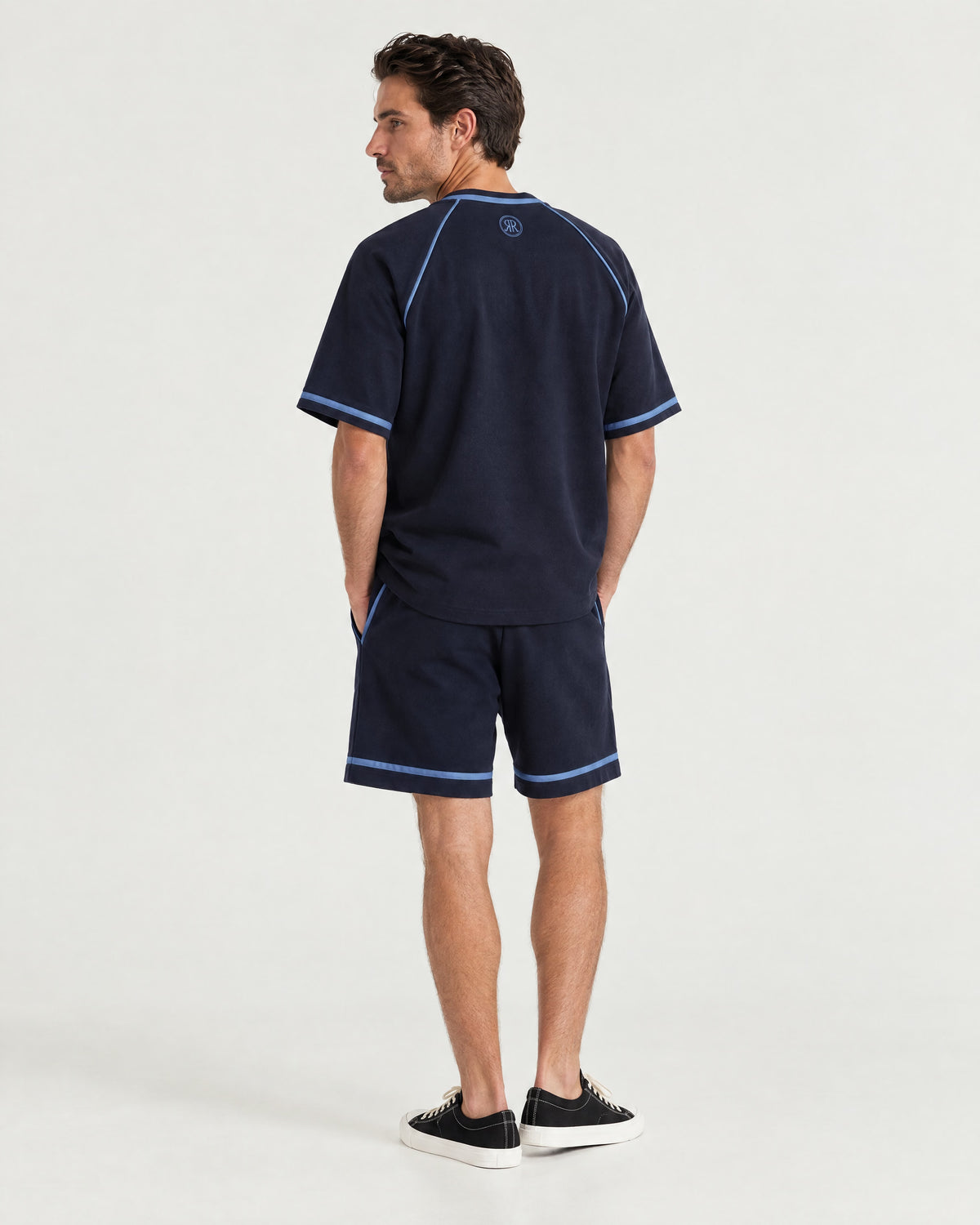 Man wearing the Romimi Léon Cotton Short, back view