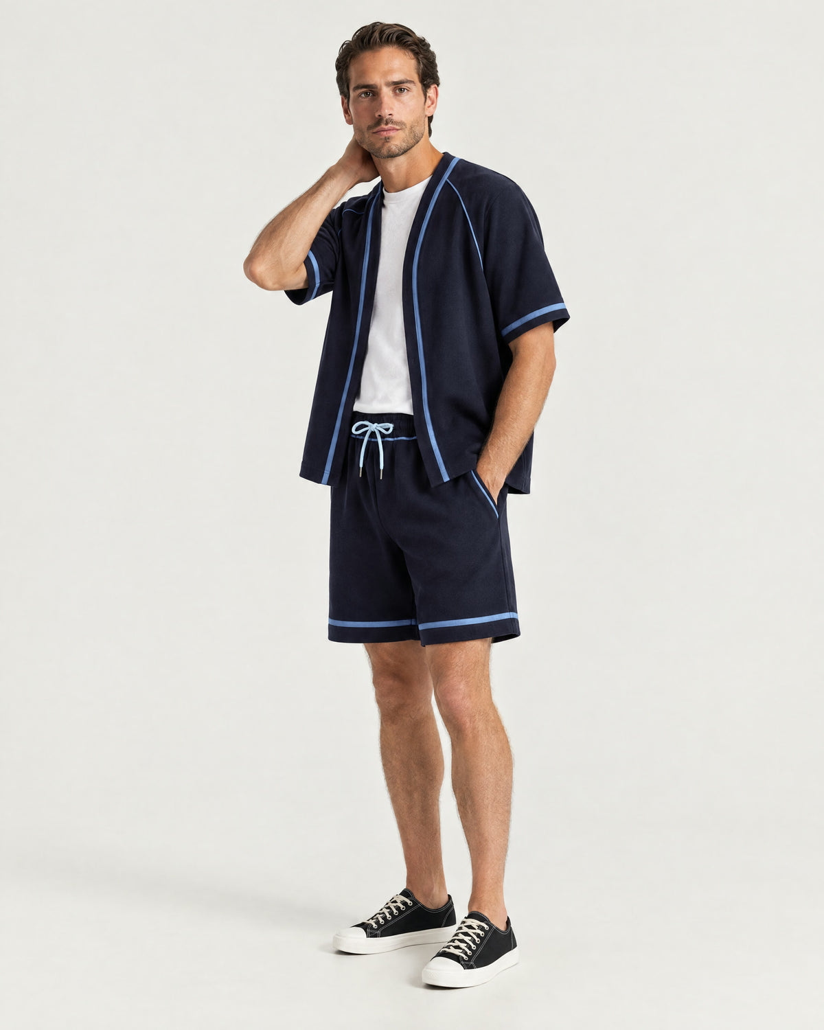 Man wearing the Romimi Léon Cotton Short, three-quarter view