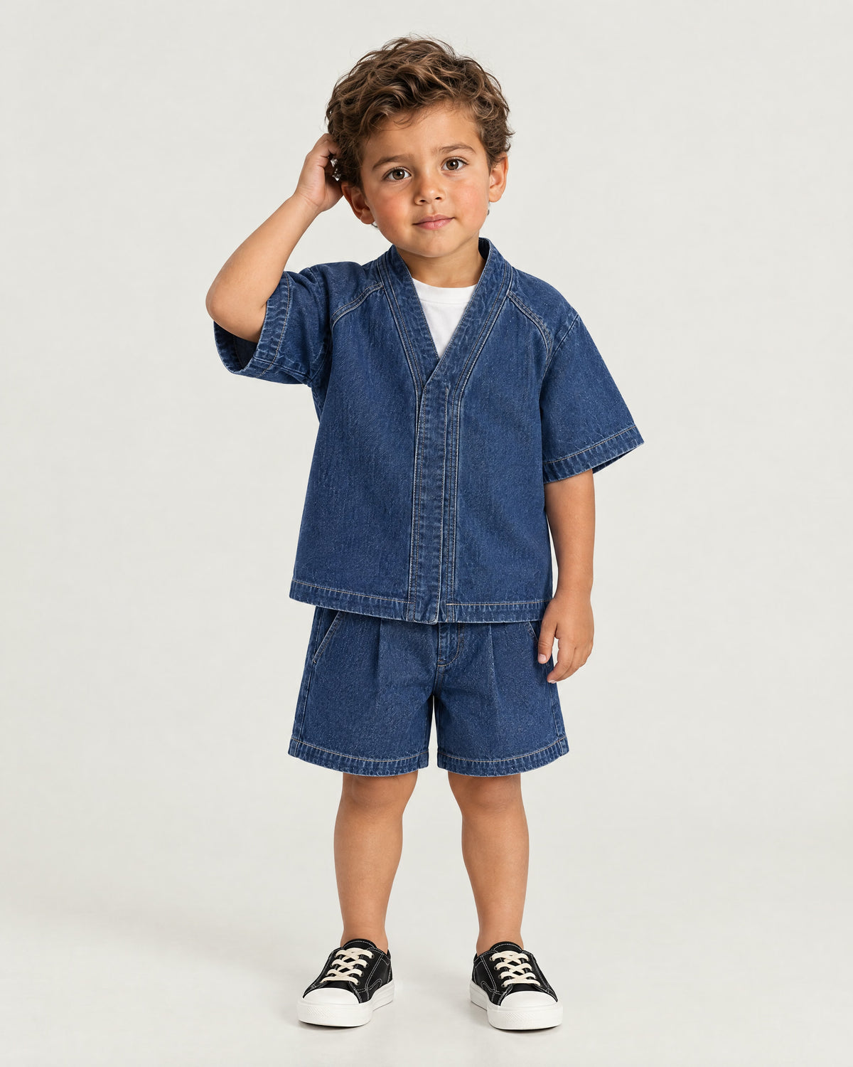 Little boy wearing the Romimi Léon Denim Shirt, front view
