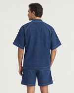 Man wearing the Romimi Léon Denim Shirt, back view