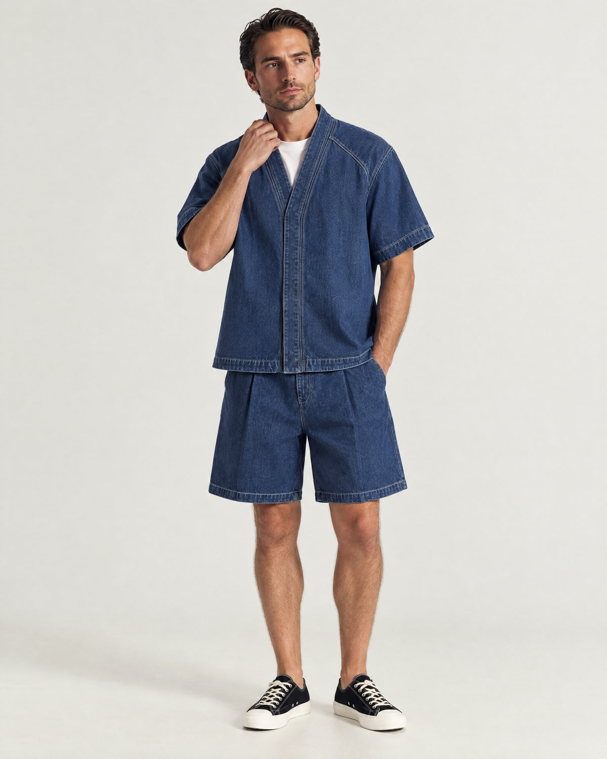 Man wearing the Romimi Léon Denim Short, front view