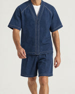 Man wearing the Romimi Léon Denim Short, full length