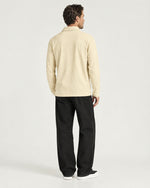 Romimi Mercerized Long Sleeve Polo in Beige, back view, worn