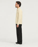 Romimi Mercerized Long Sleeve Polo in Beige, side view, worn