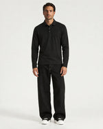 Romimi Mercerized Long Sleeve Polo in Black, worn