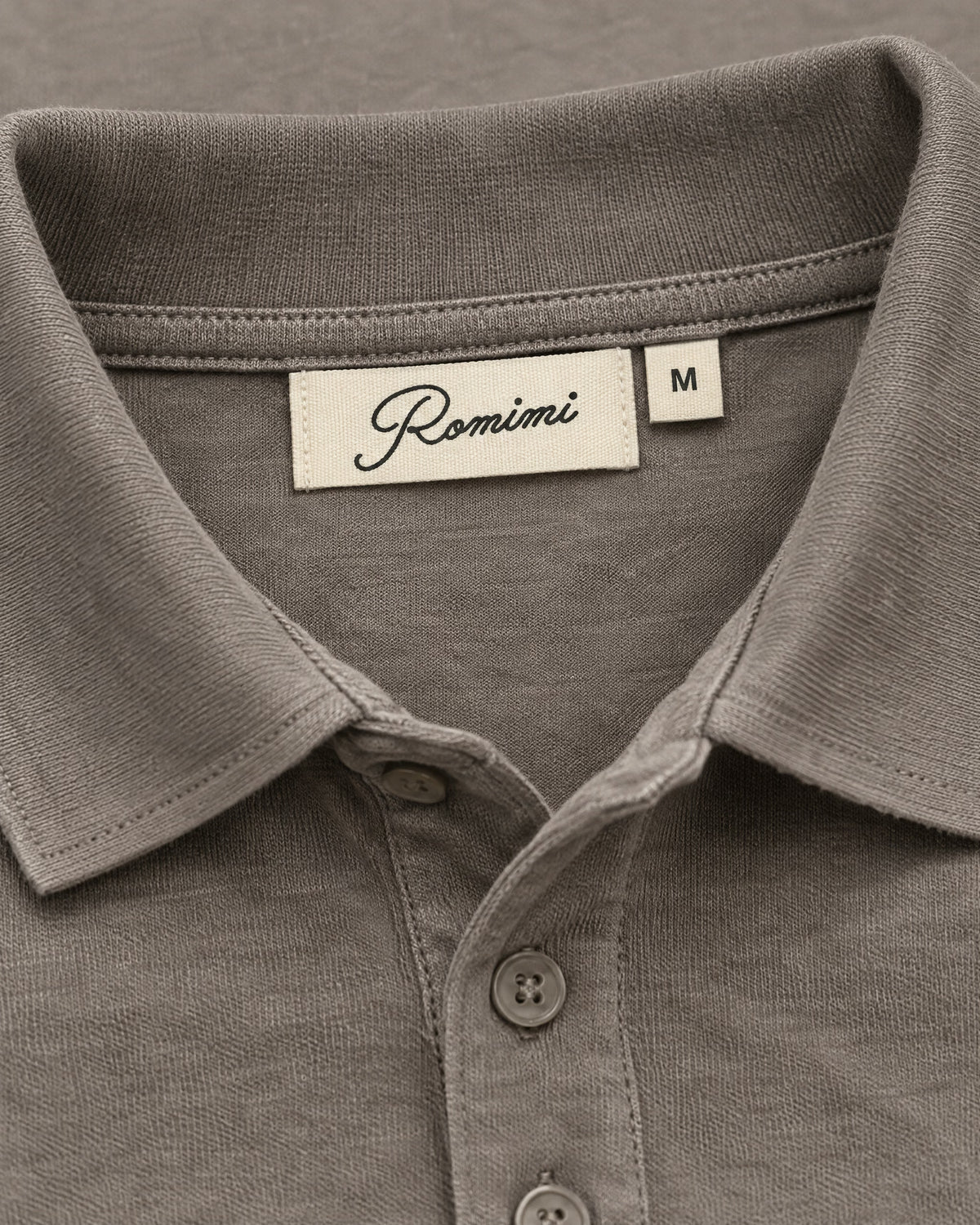 Romimi Mercerized Long Sleeve Polo in Grey, label close-up