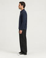 Romimi Mercerized Long Sleeve Polo in Navy, side view, worn