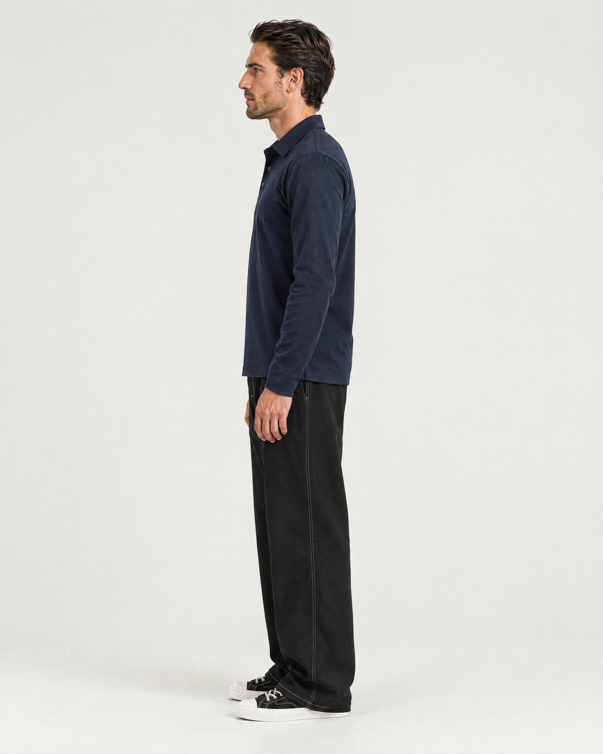 Romimi Mercerized Long Sleeve Polo in Navy, side view, worn