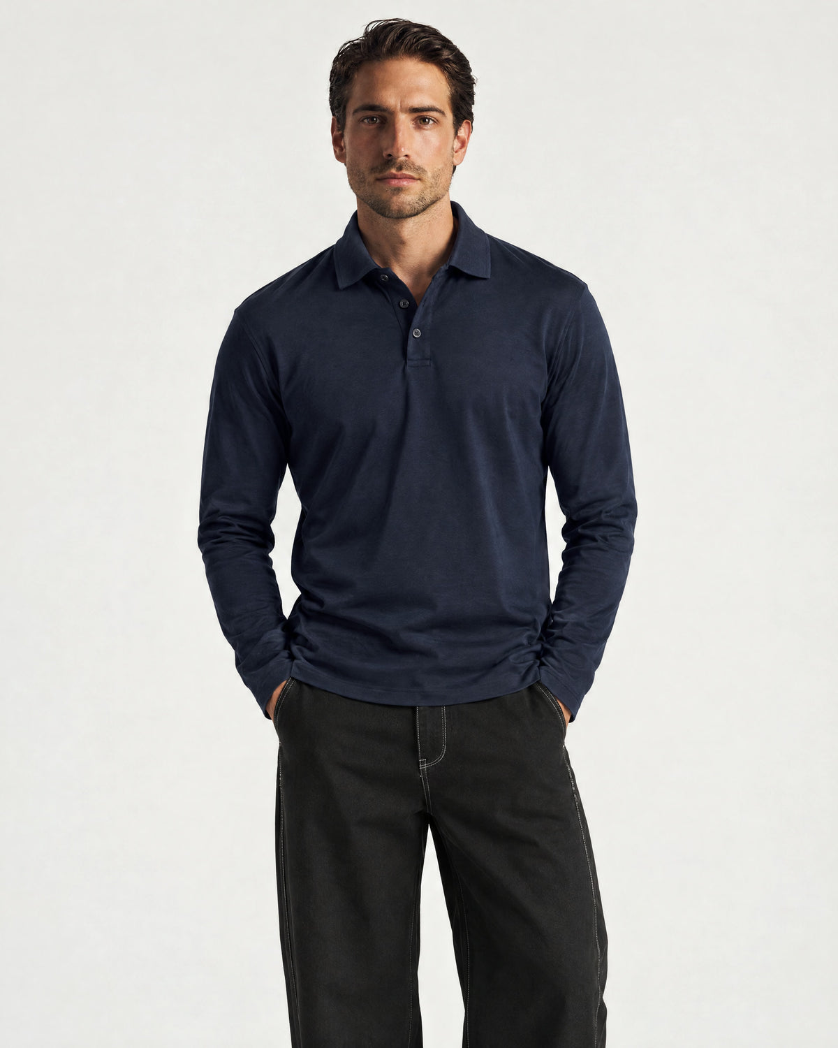Romimi Mercerized Long Sleeve Polo in Navy, worn