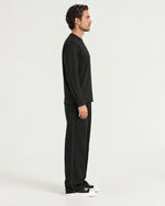 Romimi Mercerized Long Sleeve Tee in Black, side view, worn