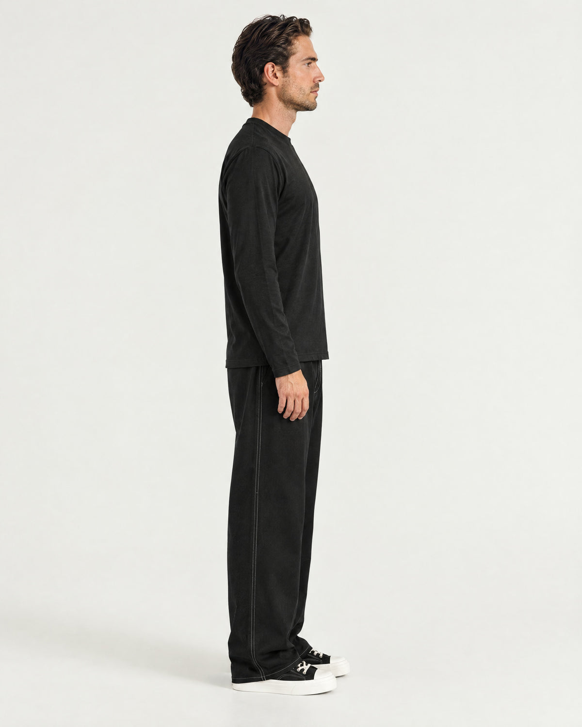 Romimi Mercerized Long Sleeve Tee in Black, side view, worn