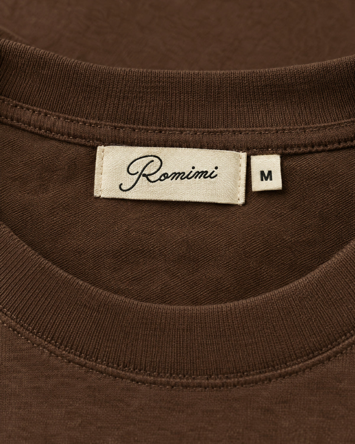 Romimi Mercerized Long Sleeve Tee in Chocolate, label close-up