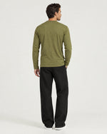 Romimi Mercerized Long Sleeve Tee in Olive, back view, worn
