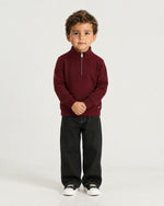 Little boy wearing the Romimi Merino Heritage Quarter-Zip, front view