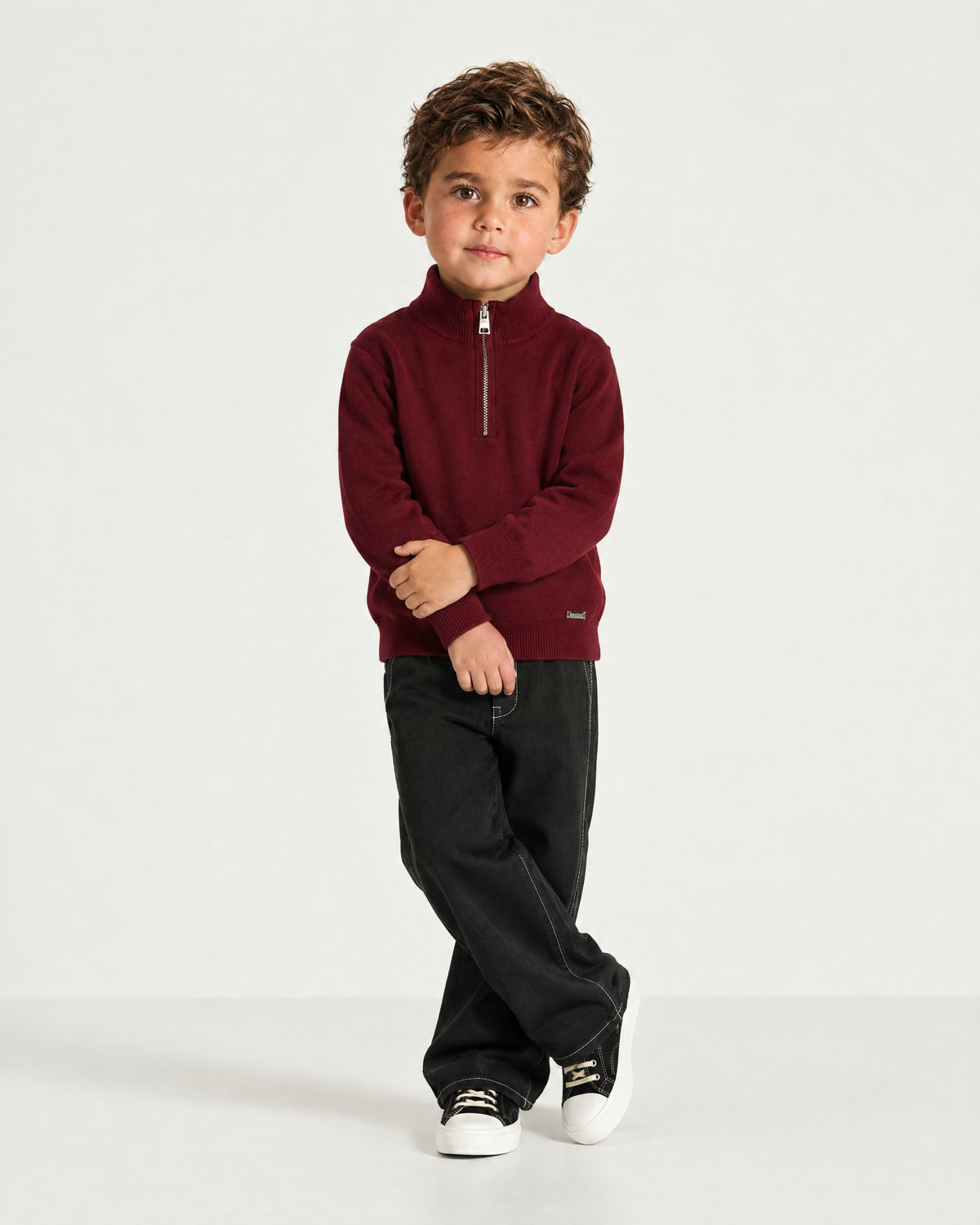 Little boy wearing the Romimi Merino Heritage Quarter-Zip, full length
