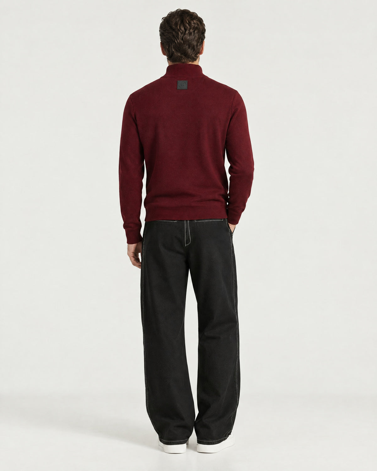Man wearing the Romimi Merino Heritage Quarter-Zip, back view