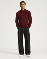 Man wearing the Romimi Merino Heritage Quarter-Zip, full length