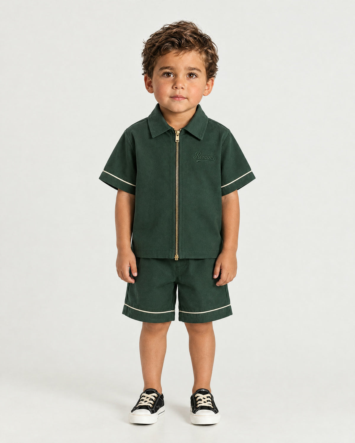 Little boy wearing the Romimi Paul Camp Collar Zip Shirt, front view