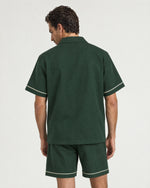 Man wearing the Romimi Paul Camp Collar Zip Shirt, back view