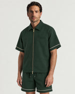 Man wearing the Romimi Paul Camp Collar Zip Shirt, front view