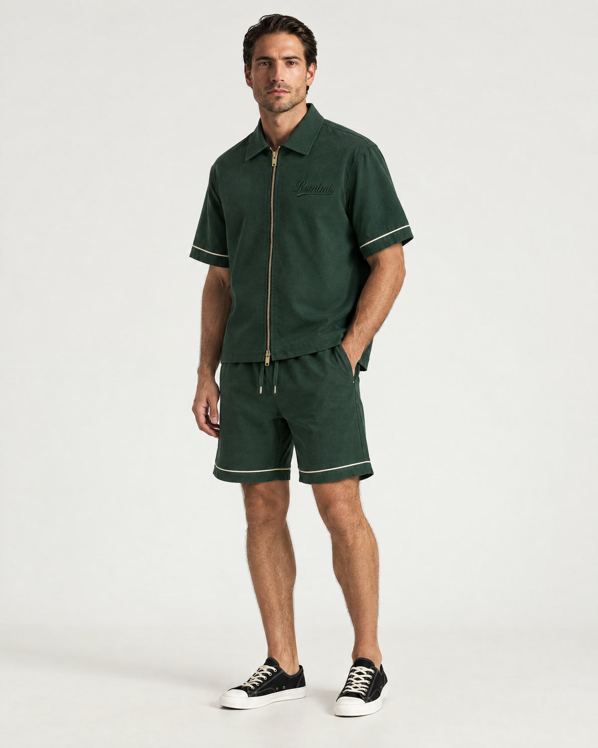 Man wearing the Romimi Paul Camp Collar Zip Shirt, full length