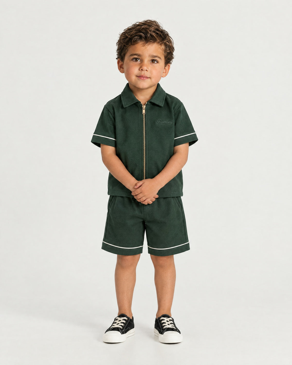 Little boy wearing the Romimi Paul Drawcord Shorts, front view