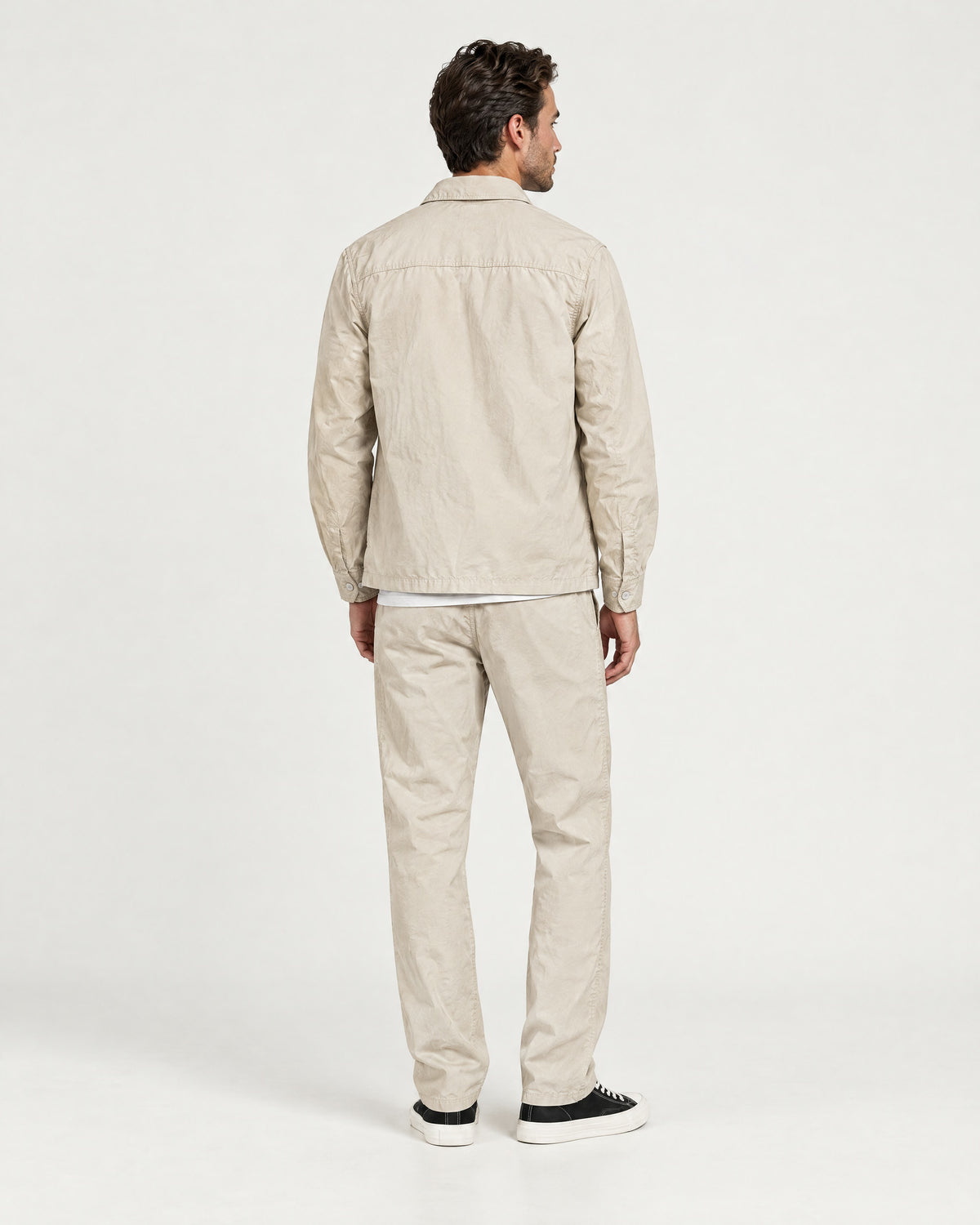 Romimi Relaxed Tech Suit in Beige, back view, worn