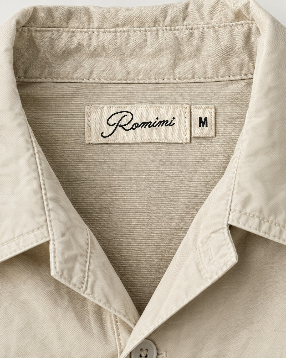 Romimi Relaxed Tech Suit in Beige, label close-up