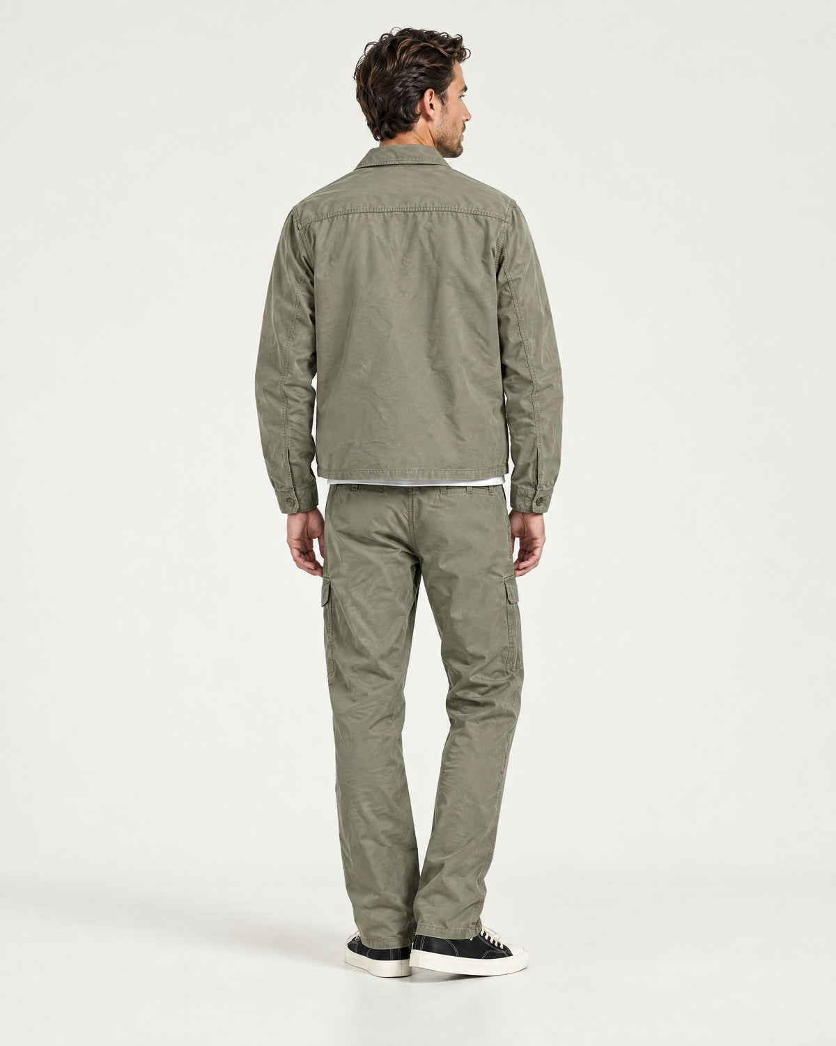 Romimi Relaxed Tech Suit in Khaki, back view, worn
