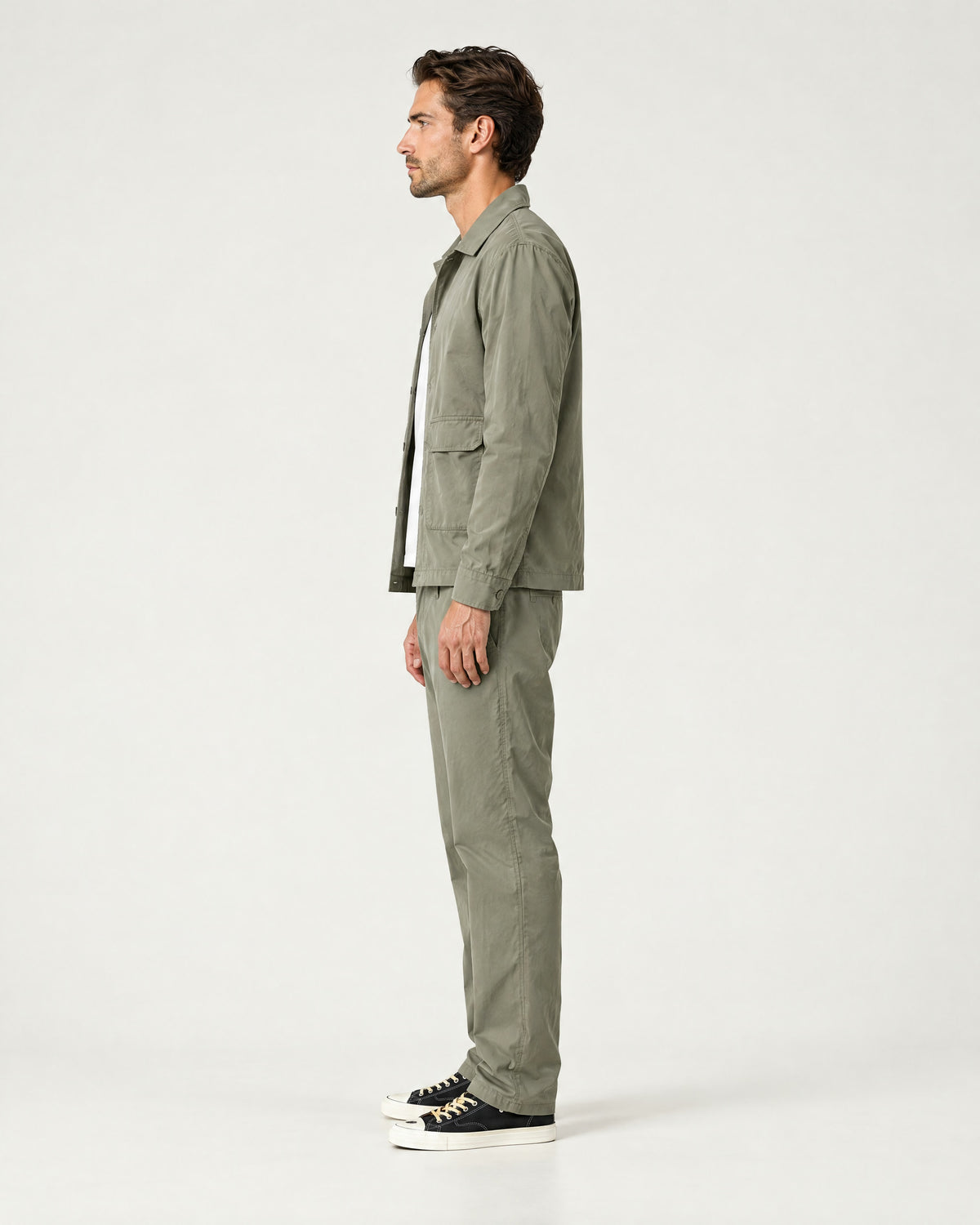 Romimi Relaxed Tech Suit in Khaki, side view, worn