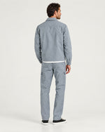 Romimi Relaxed Tech Suit in Sky Blue, back view, worn