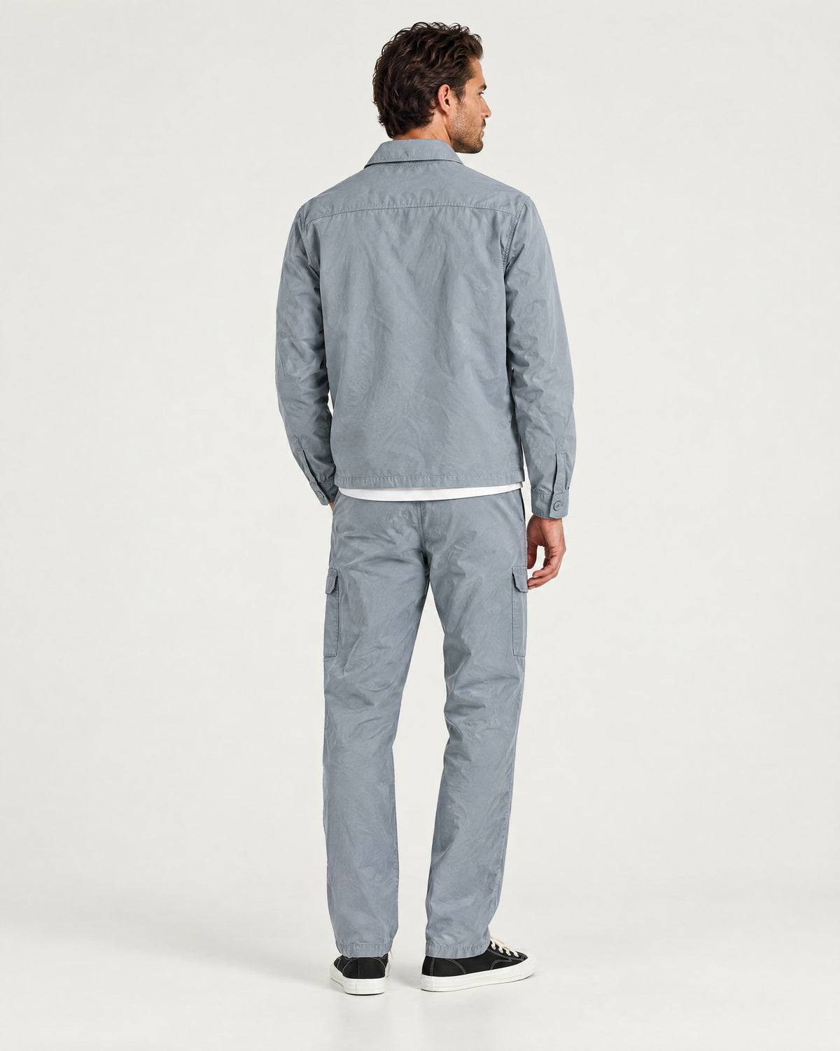 Romimi Relaxed Tech Suit in Sky Blue, back view, worn
