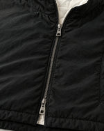 Romimi Reversible Windbreaker Gilet in Black, fabric close-up