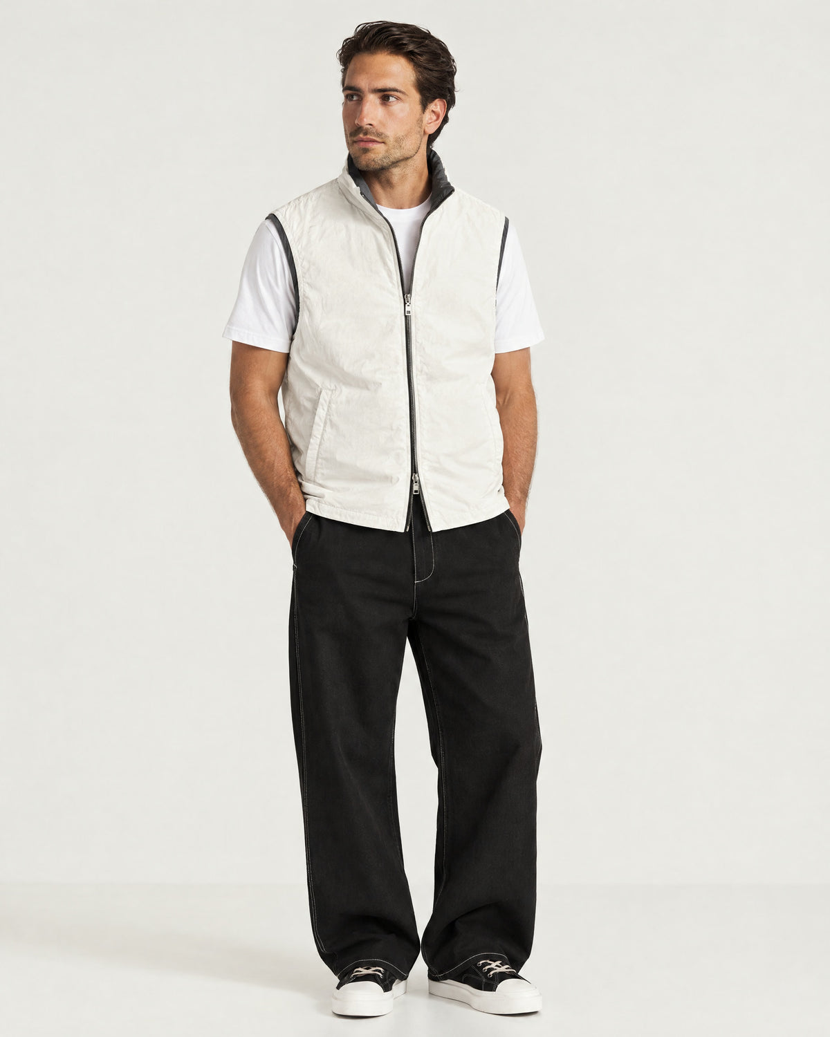 Romimi Reversible Windbreaker Gilet in Black, reversible side, worn