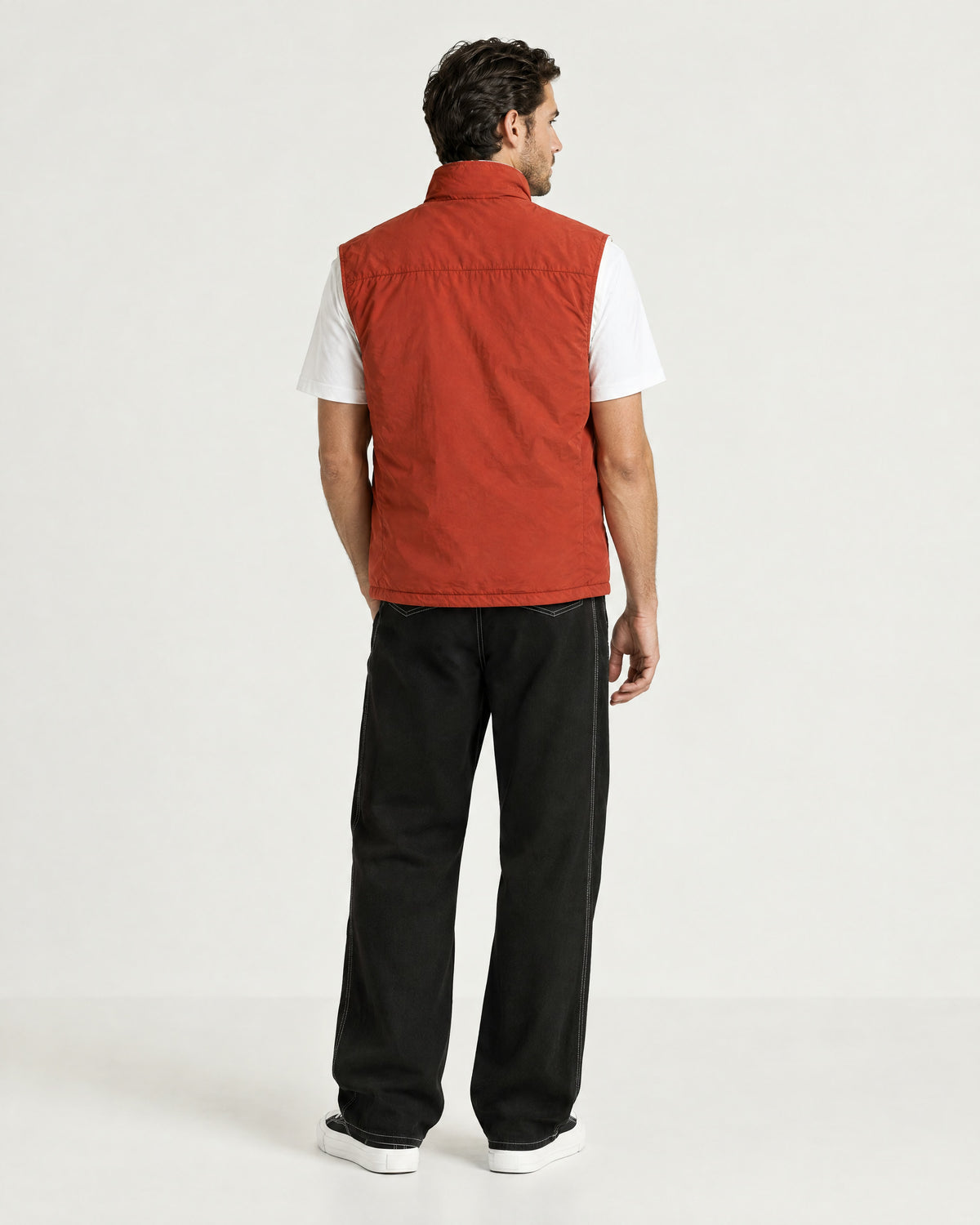 Romimi Reversible Windbreaker Gilet in Brick, back view, worn