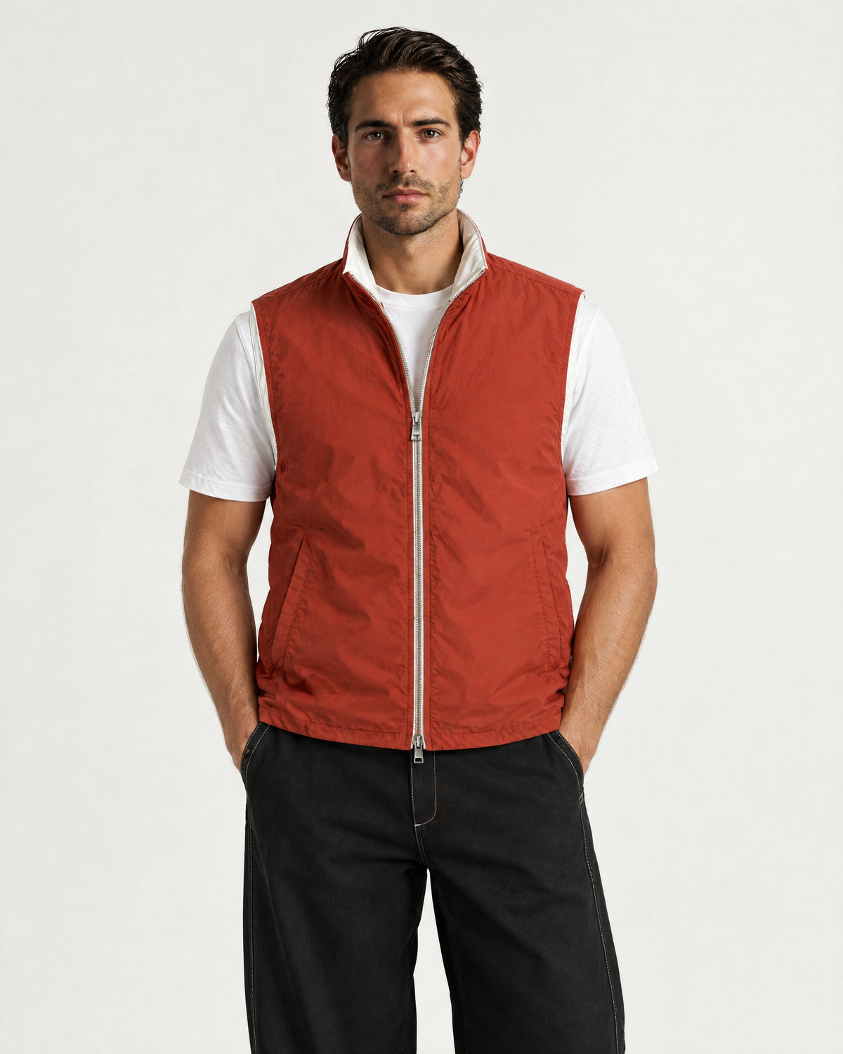 Romimi Reversible Windbreaker Gilet in Brick, worn