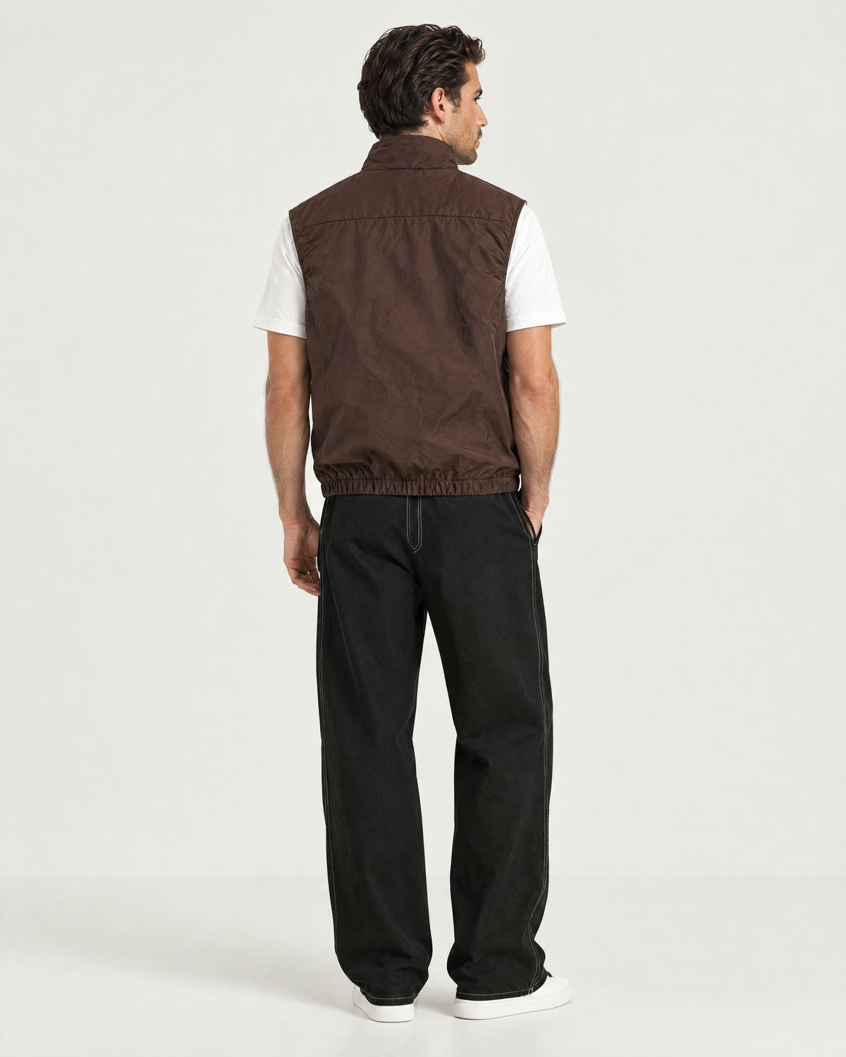 Romimi Reverso Gilet in Brown, back view, worn
