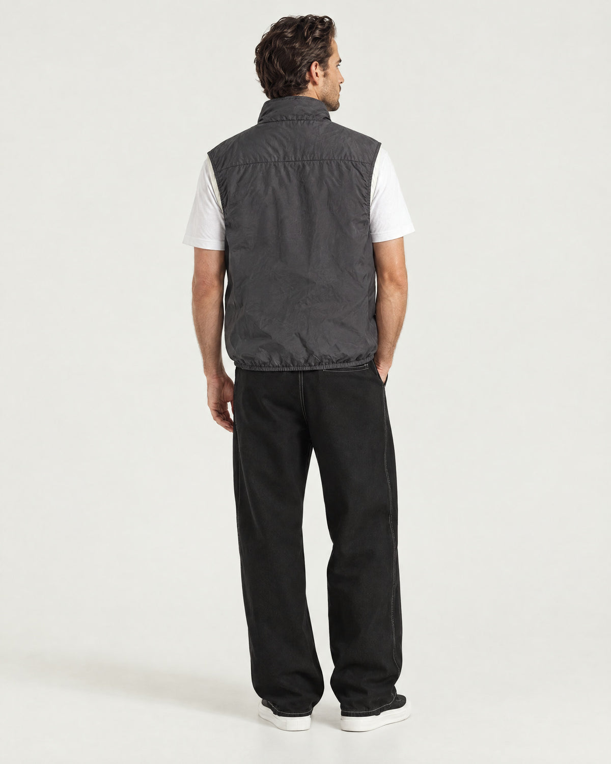 Romimi Reverso Gilet in Charcoal, back view, worn