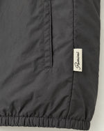 Romimi Reverso Gilet in Charcoal, label close-up