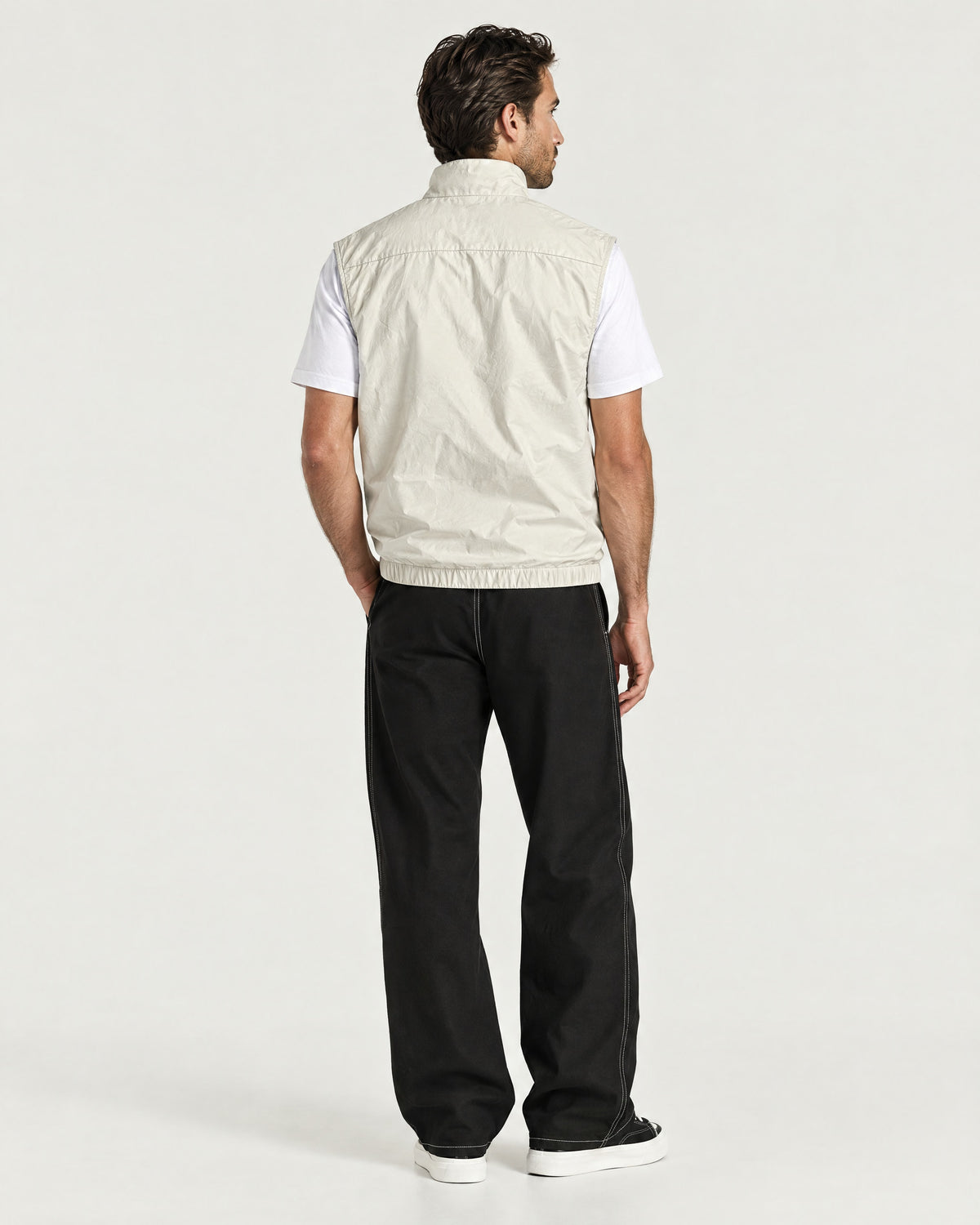 Romimi Reverso Gilet in Cream, back view, worn