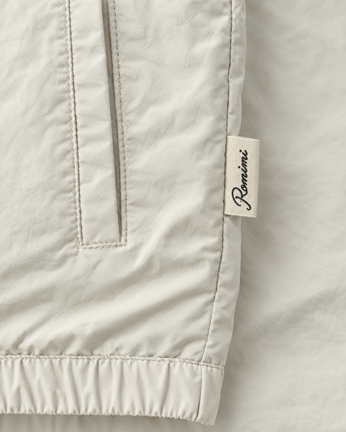 Romimi Reverso Gilet in Cream, label close-up
