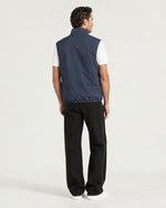 Romimi Reverso Gilet in Navy, back view, worn