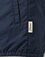 Romimi Reverso Gilet in Navy, label close-up