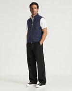 Romimi Reverso Gilet in Navy, full length, worn