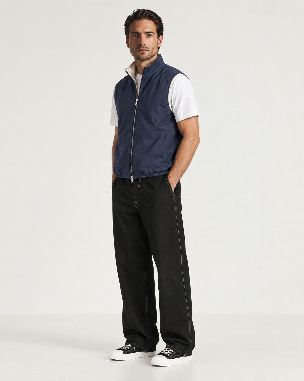 Romimi Reverso Gilet in Navy, full length, worn